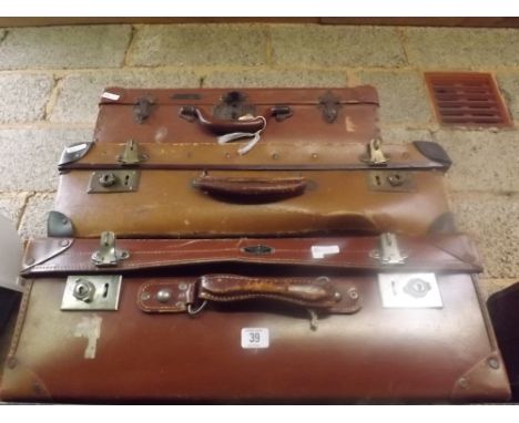 THREE BROWN VINTAGE SUITCASES