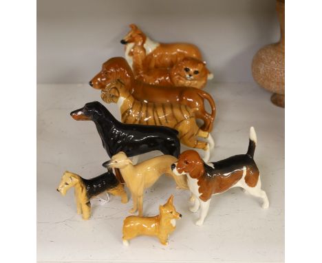 A selection of Beswick dogs, to include a Corgi, Daschund, Lurcher, Beagle, Doberman, Fox Terrier, Lochinvar of Ladypark, tog