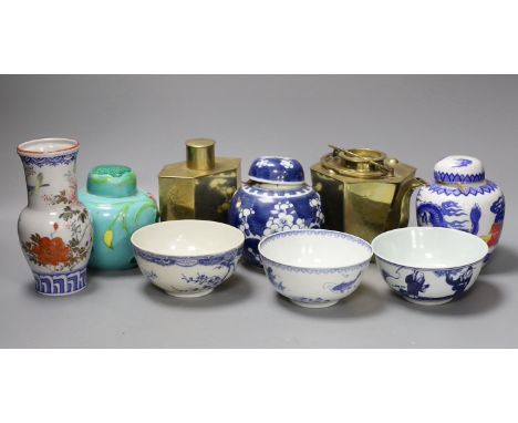 A Chinese brass tea caddy and kettle together with three similar blue and white porcelain bowls, three jars and covers and a 