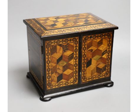 A 19th century Tunbridge ware specimen cube marquetry and coromandel table cabinet, label to underside reads ‘T.Barton, Late 