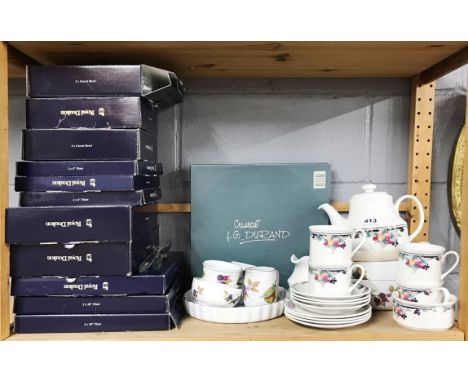 An extensive quantity of Royal Doulton and Royal Worcester tea and dinner china, mostly 'Autumns Glory'.
