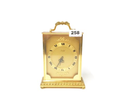 An Imhof gilt brass mantel clock, H. 21cm.