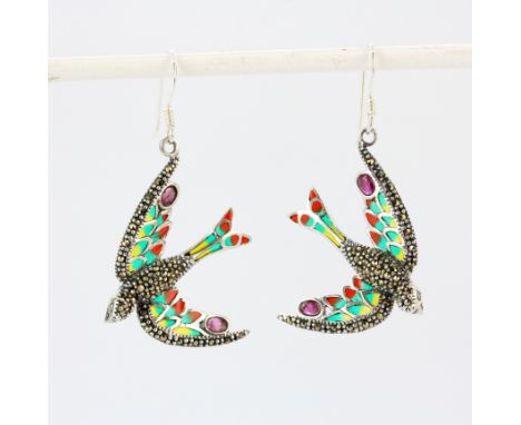 A pair of 925 silver and enamel bird shaped drop earrings each set with marcasite and an oval cut ruby, L. 3.5cm.