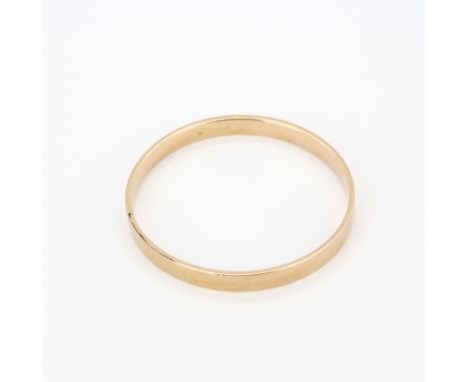 A hallmarked 9ct gold bangle, dia. 7.5cm. Approx. 11.1gr.&nbsp;