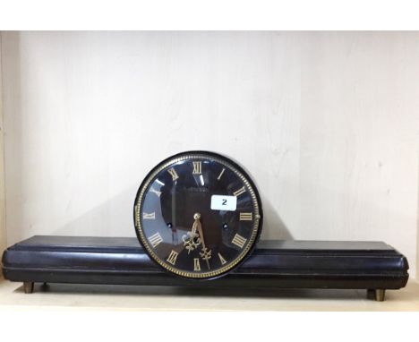 A stylish 1950's Japanese AICHI chiming mantel clock, W. 64cm.