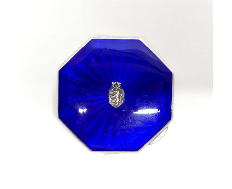 An enamelled Art Deco white metal powder compact, W. 8cm.