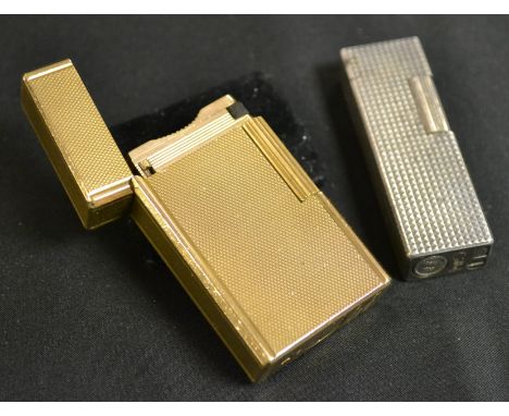 A Vintage SJ Dupont lighter; a Calibri lighter (2)