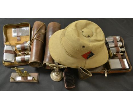 Militaria - a Boer War type pith helmet; a pair of leather gaiters; two travelling alter crucifixes; a leather dice shaker; a