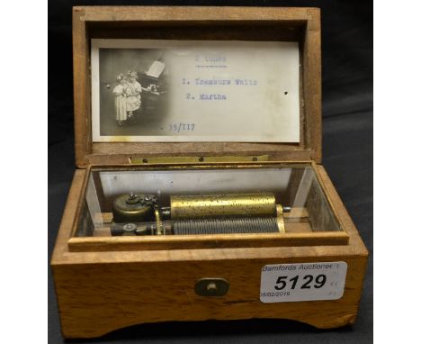 An early 20th century Swiss rectangular casket music box, 5.5cm cylinder playing two airs on a one-piece comb, tune sheet no.