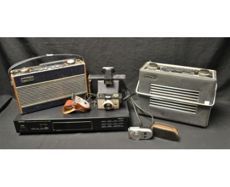 A Denon stereo tuner TU-215RD; a Hacker VHF Herald radio; a Roberts R600 radio; a camera and two viewfinders