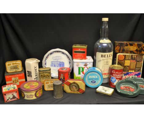 Advertising - a quantity of tins; brewery memorabilia including a large Bells whisky bottle; a pair of pictorial Gomersal Co-