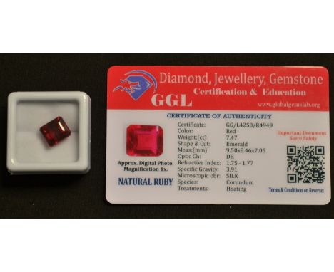 A loose rectangular emerald cut corundum ruby, measuring 9.50mm x 8.46mm x 7.05mm, calculated stone weight 7.47ct, clarity VV