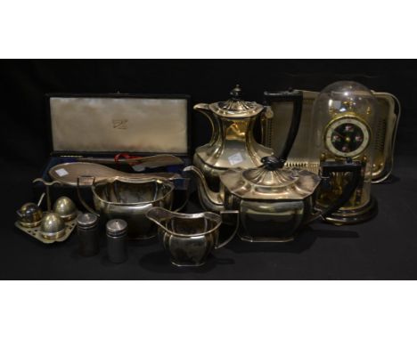 A silver hairbrush and comb set, Birmingham 1946, boxed; an EPNS four pirece tea service; a brass anniversary clock; etc