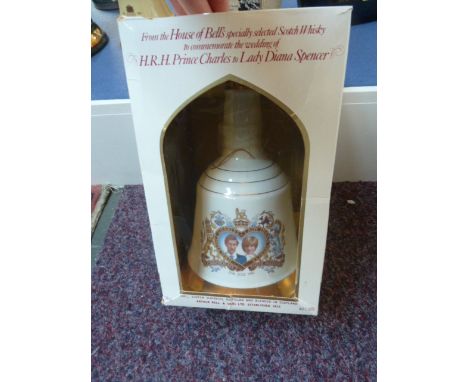 A boxed and sealed Bell's Scotch whisky commemorative Wade porcelain decanter "To Commemorate the Wedding of  HRH Prince Char