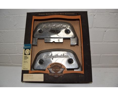 A pair of Harley Davidson footboard covers