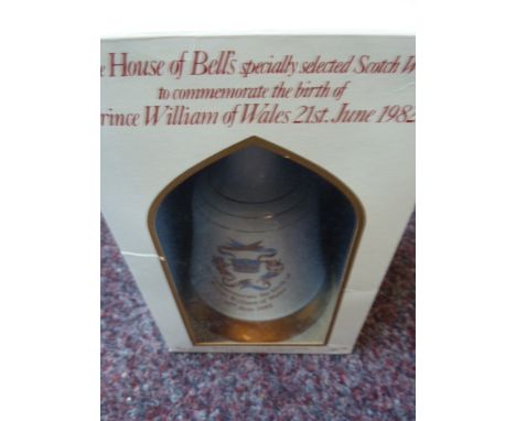 A boxed and sealed Bell's Scotch whisky commemorative Wade porcelain decanter "To Commemorate the birth of Prince William of 