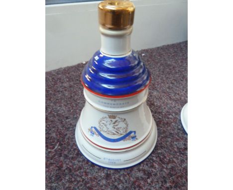 A sealed Bell's Scotch whisky commemorative Wade porcelain decanter "To Commemorate the birth of Princess Beatrice on 8th Aug