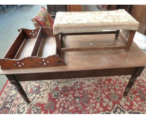 An oak stool, a hanging shelf, and a Regency mahogany side table reduced in height