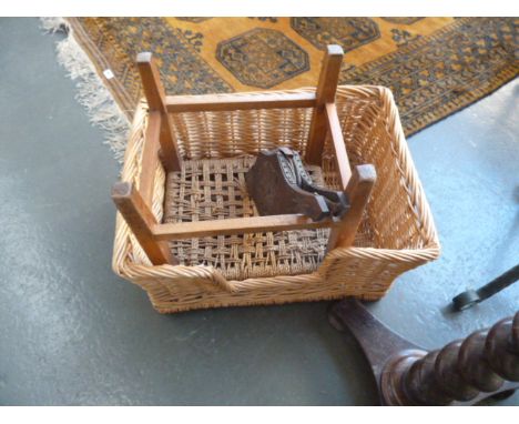A wicker dogs bed together with a small wicker foot stool and a R.A Lister and Co. set of bellows (3)