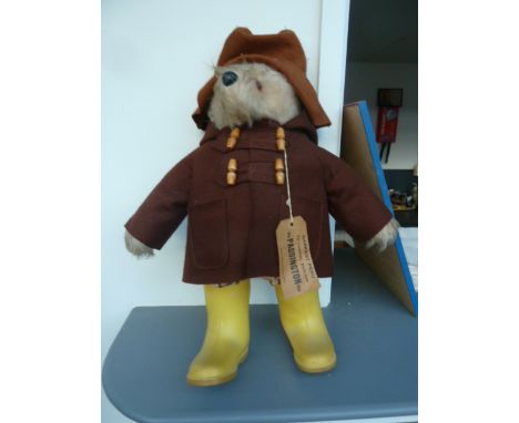 An Aunty Lucy with 1978 label, original bloomers and enclosed pennies and an earlier Paddington Bear (Design Registration No.