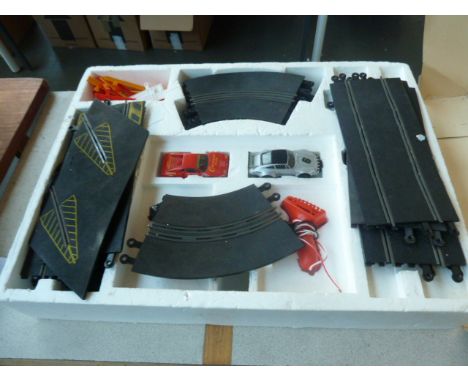 A boxed Scalextric Le Mans 24 hour set with Porsche 911 3.3 and Ferrari GTO cars