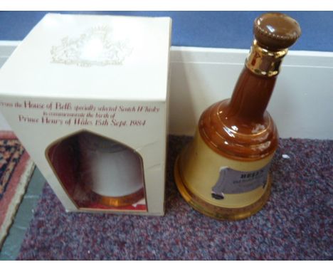A boxed and sealed Bell's Scotch whisky commemorative Wade porcelain decanter "To Commemorate the birth of Prince Henry of Wa