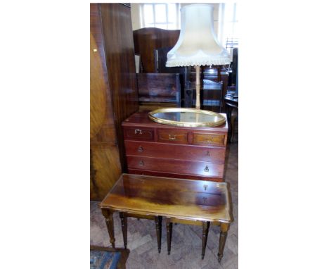 Mereden chest of drawers, gilt wall mirror, standard lamp complete with shade and nest of three tables. Condition reports are