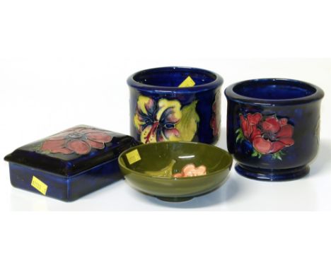 Two Moorcroft planters, box and cover and a green ground bowl. Condition reports are not available for our Interiors Sale.