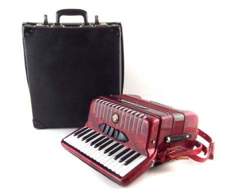 Guerrini piano accordion, with case which measures 43cm wide