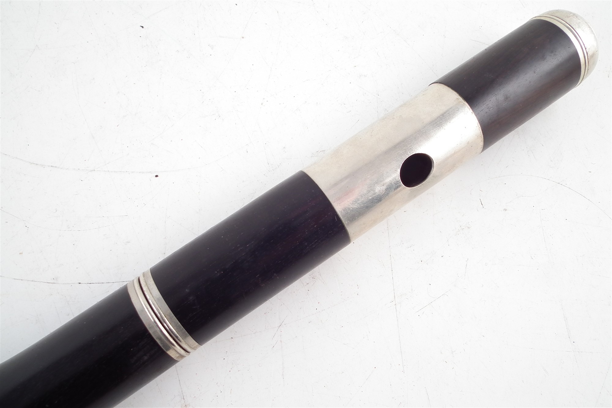 Ebony flute, unmarked, 69cm long in wood case