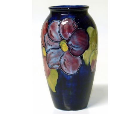 Moorcroft vase. Condition reports are not available for our Interiors Sale.