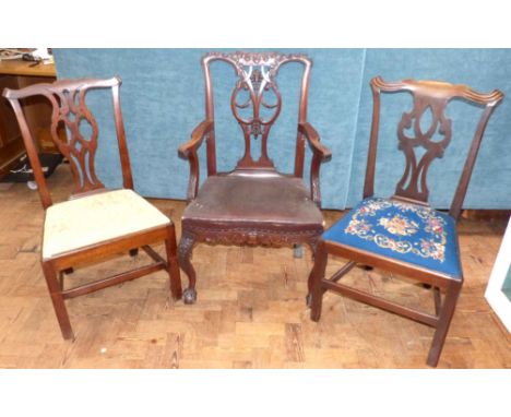 Two George II style dining chairs and Chippendale style open elbow chair. Condition reports are not available for our Interio