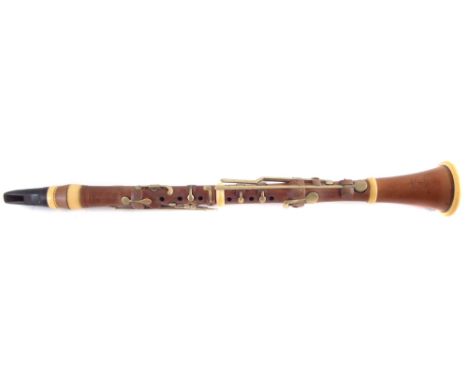 Boxwood and ivory clarinet by Bilton, stamped with 93 Westminster Bridge Road London address, with carry case and accessories