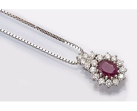 14 kt Gold Anhänger mit Brillanten und Rubin,   WG 585/000, tropfenförmig, bes. mit einem ovalfacett. Rubin ca. 0.60 ct umgeb