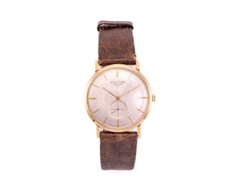 An 18ct gold Longines wristwatch, featuring a swiss made hand-wound movement caliber: 19.4 in a hallmarked 18ct yellow gold c