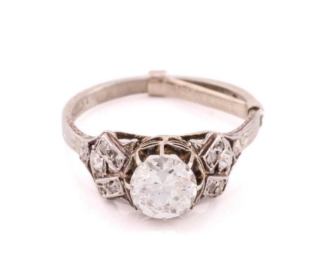 A single stone diamond ring; the round Old European cut diamond, approximately 6.4mm x 6.91mm, depth 3.91mm, in eight claw se