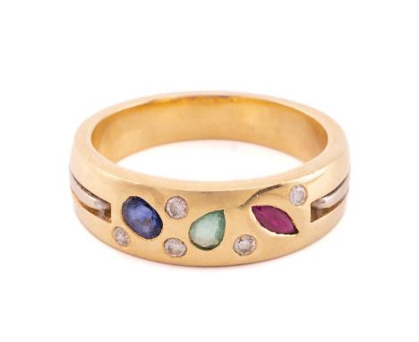 A sapphire, ruby, emerald and diamond ring, rub over set with a pear cut emerald flanked by an oval mixed cut sapphire and a 