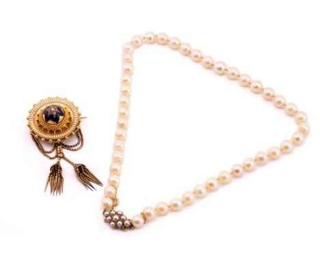 A Victorian mourning brooch and a single-strand cultured pearl necklace; the mourning brooch of circular dome form, the centr