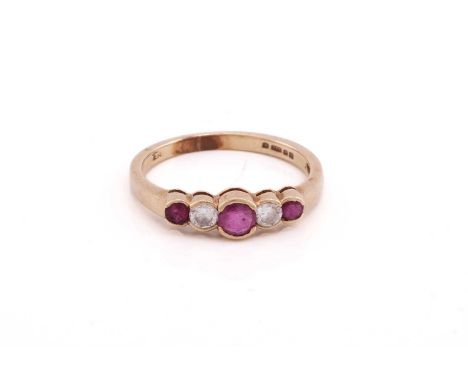 A five stone ruby and diamond half hoop ring, the graduated circular cut stones in rub-over settings to a plain 9 carat gold 