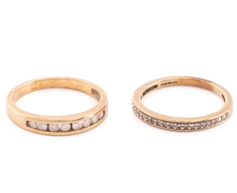 Two 9 carat gold and diamond half hoop eternity rings., one channel set with eight round brilliant cut diamonds, ring size N 