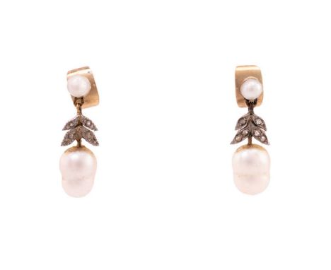 A pair of early 20th-century pearl and diamond earrings, designed as leaf-capped acorns, each consisting of a potato-shaped w