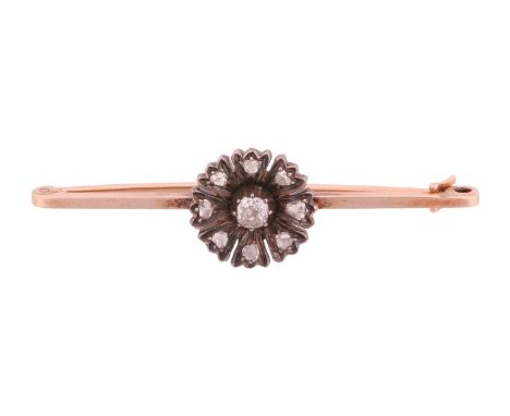 A diamond-set flowerhead bar brooch, in the form of a coreopsis flower, centred with an old-cut diamond of 4.0 x 3.6 mm in a 