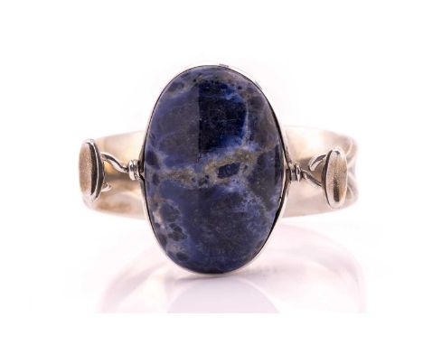 Georg Jensen - 'Arm Ring' with sodalite, a tension clamp opening bangle with an oval sodalite panel set in a ring mount, to a