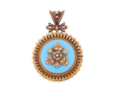 A Victorian Etruscan Revival mourning brooch, of domed circular form, composed of a floral motif fully embellished with split