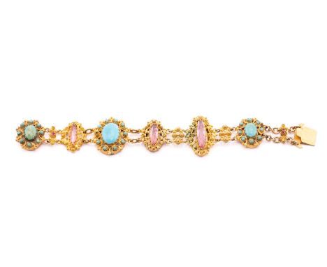 A 19th-century bracelet set with pink paste and imitation turquoise, in gilt cannetille work mounts, fastened with a tongue a