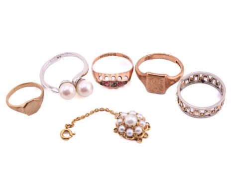 A group of five various rings and a pearl set cluster clasp, comprising a 9ct yellow gold ruby and diamond five stone ring, r