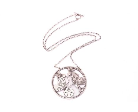 Georg Jensen - a butterfly necklace, the round pendant depicting two butterflies resting upon bellflowers, attached to a cabl