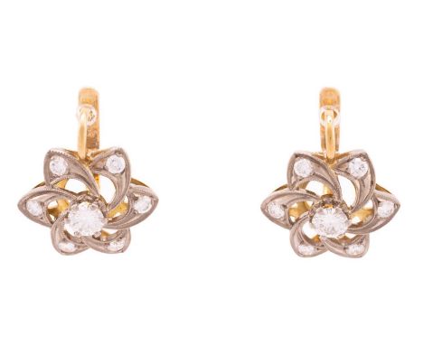 A pair of Russian diamond cluster earrings, of swirl flower form, each containing a 4.4 mm circular-cut diamond at the centre