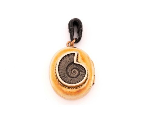 A Victorian locket set with an ammonite, the hinged oval locket contains an ammonite fossil on the cover, collet set in mount