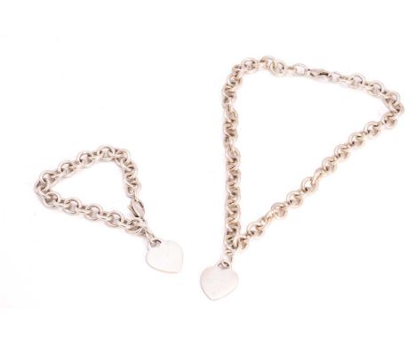 Tiffany &amp; Co. - A silver plain 'Return to Tiffany' heart tag necklace and a matching bracelet; the necklace comprises a h